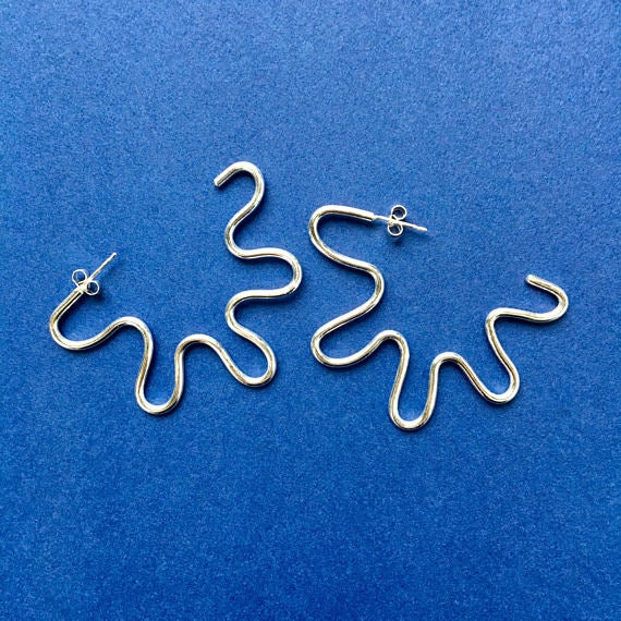 XXL Wiggle Hoops by [Alice Chandler](https://alicechandler.bigcartel.com/product/xxl-wiggle-hoops). Priced at £50