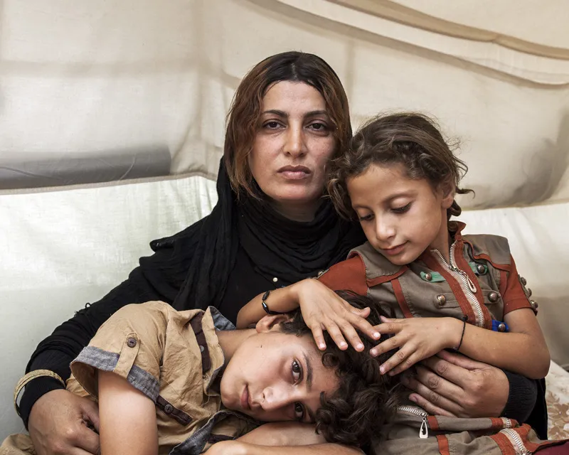 Amira and her Children - Ivor Prickett, 2014