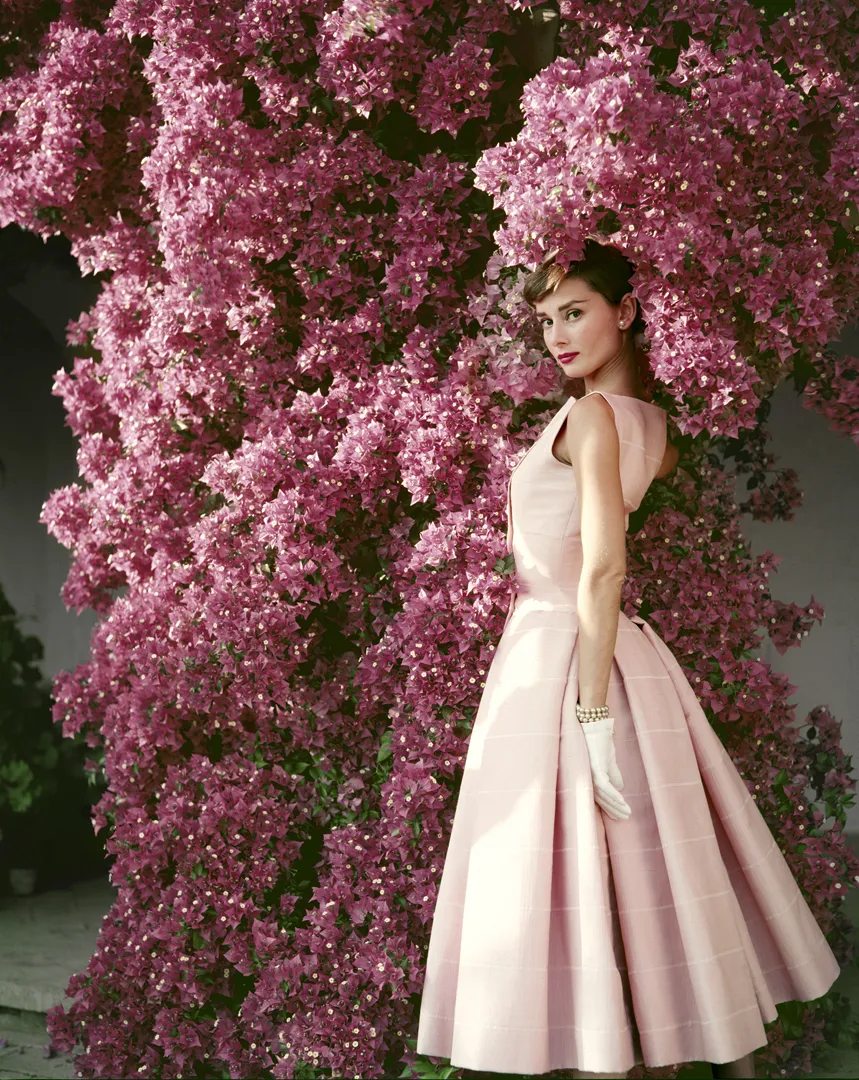 Audrey Hepburn photographed wearing Givenchy for Glamour magazine in June, 1955. The photoshoot took place in Rome, Italy. Audrey Hepburn, 1955, Norman Parkinson © Norman Parkinson / Iconic Images