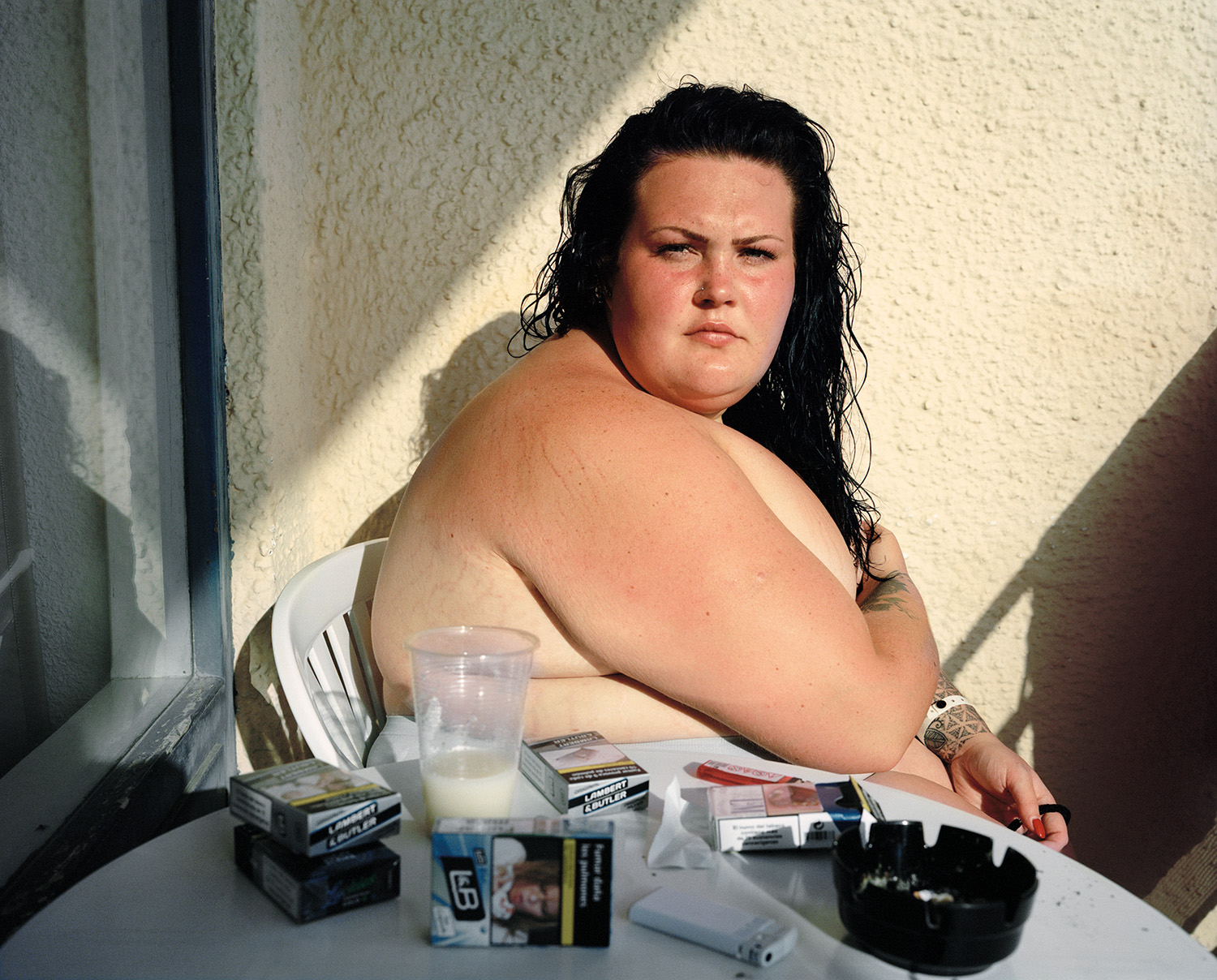 Shannon, age 22, on holiday. Costa del Sol, Spain, 2018 © Abbie Trayler-Smith