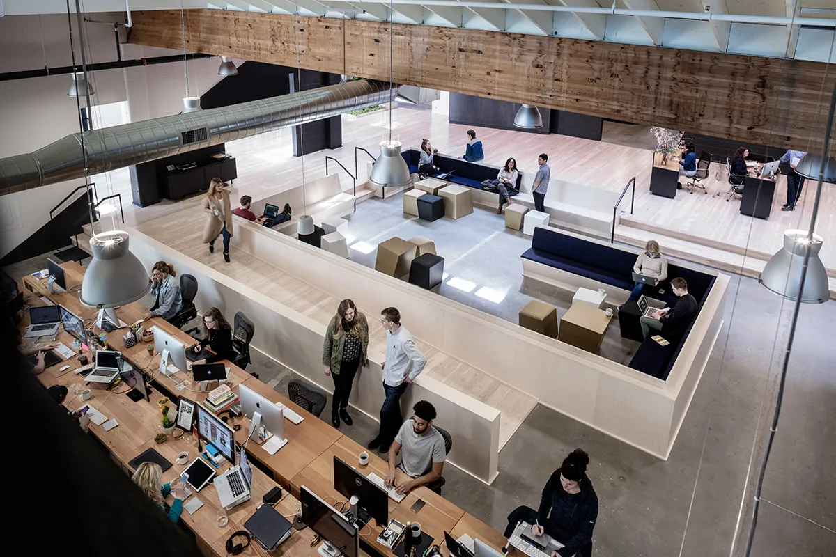 Swift Colony: Seen from the mezzanine, the Colony is a space to gather for staff-wide meetings, events and conversation.