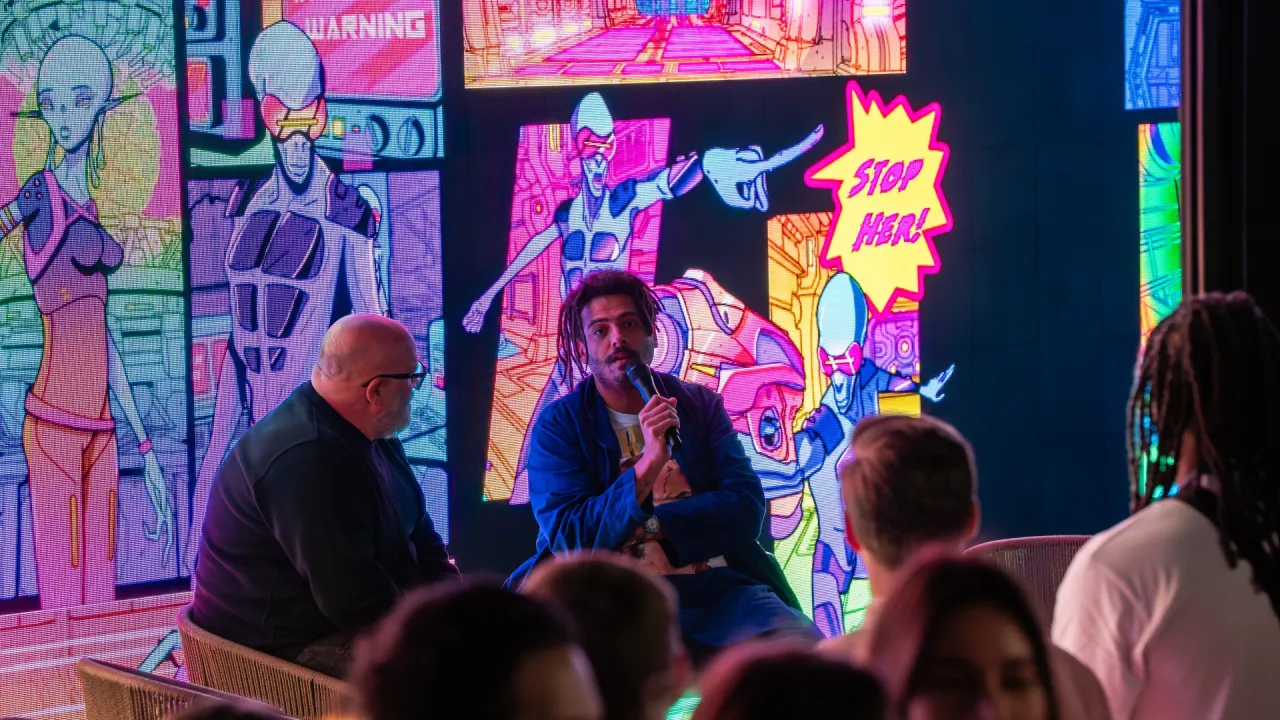 DJ Seth on the mic being interviewed by Simon Dunmore
