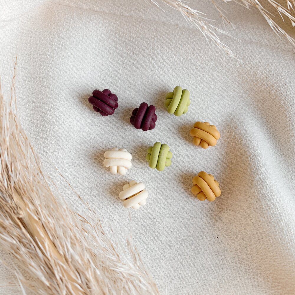 Knot studs by [Soft Corner](https://www.wearesoftcorner.com/shop/knotstuds). Priced at $20
