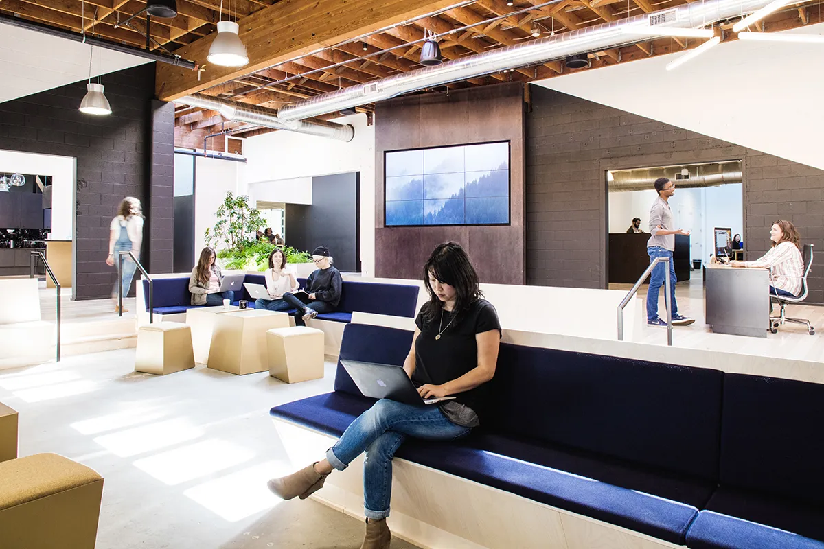 Swift Media Wall: The Colony group gathering space sits alongside a 9-screen media wall for large group presentations, events and all-staff meetings.