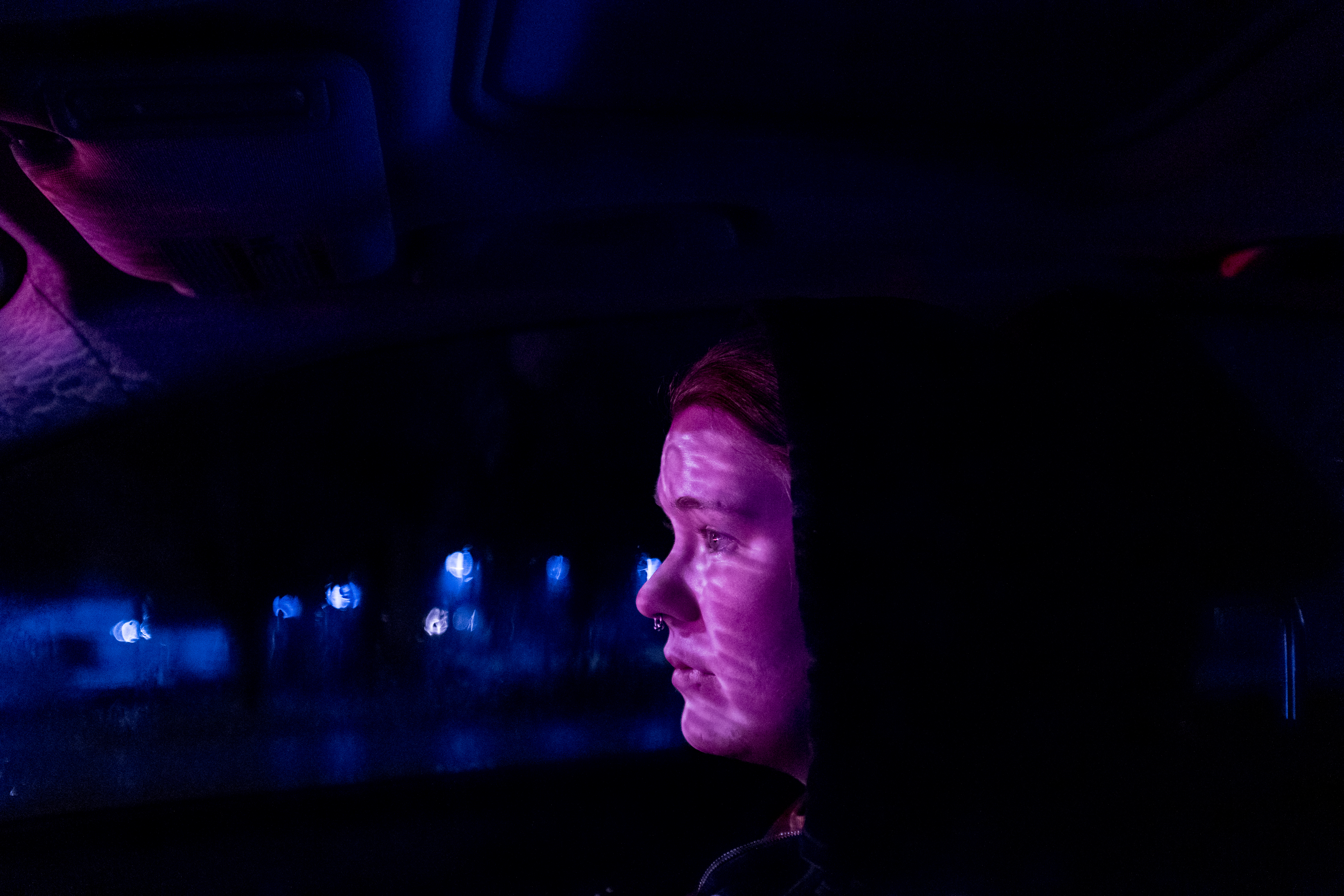 Allie in traffic after losing a close friend in her recovery group to an overdose. © Mark E. Trent